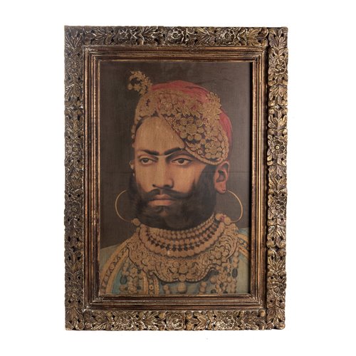 Portrait of Maharaja Udaipur with sculpted wooden frame