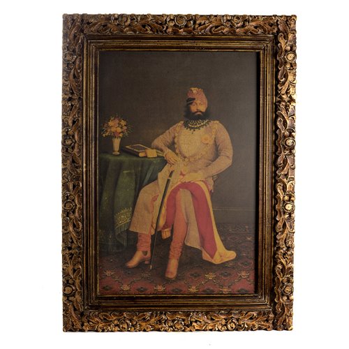 Portrait of Maharaja Jaswant Singh sitting with sculpted wooden frame
