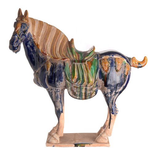 Horse tang reactive glazed blue carved L